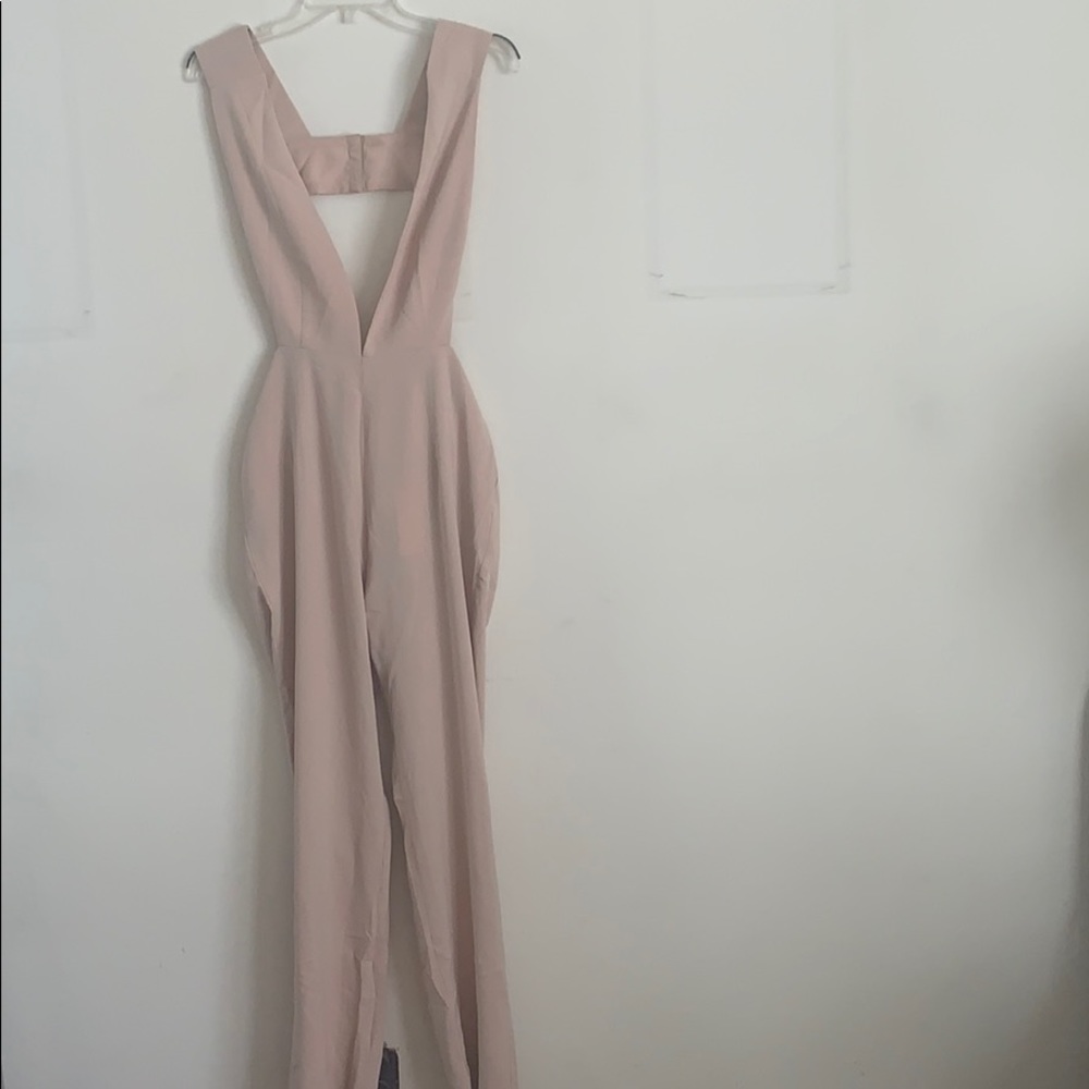 Beige plunging jumpsuit from Nasty Gal